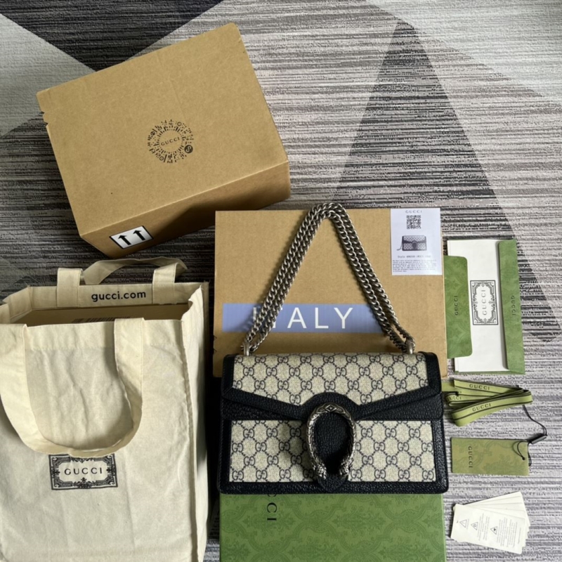 G*u*i top handle bags